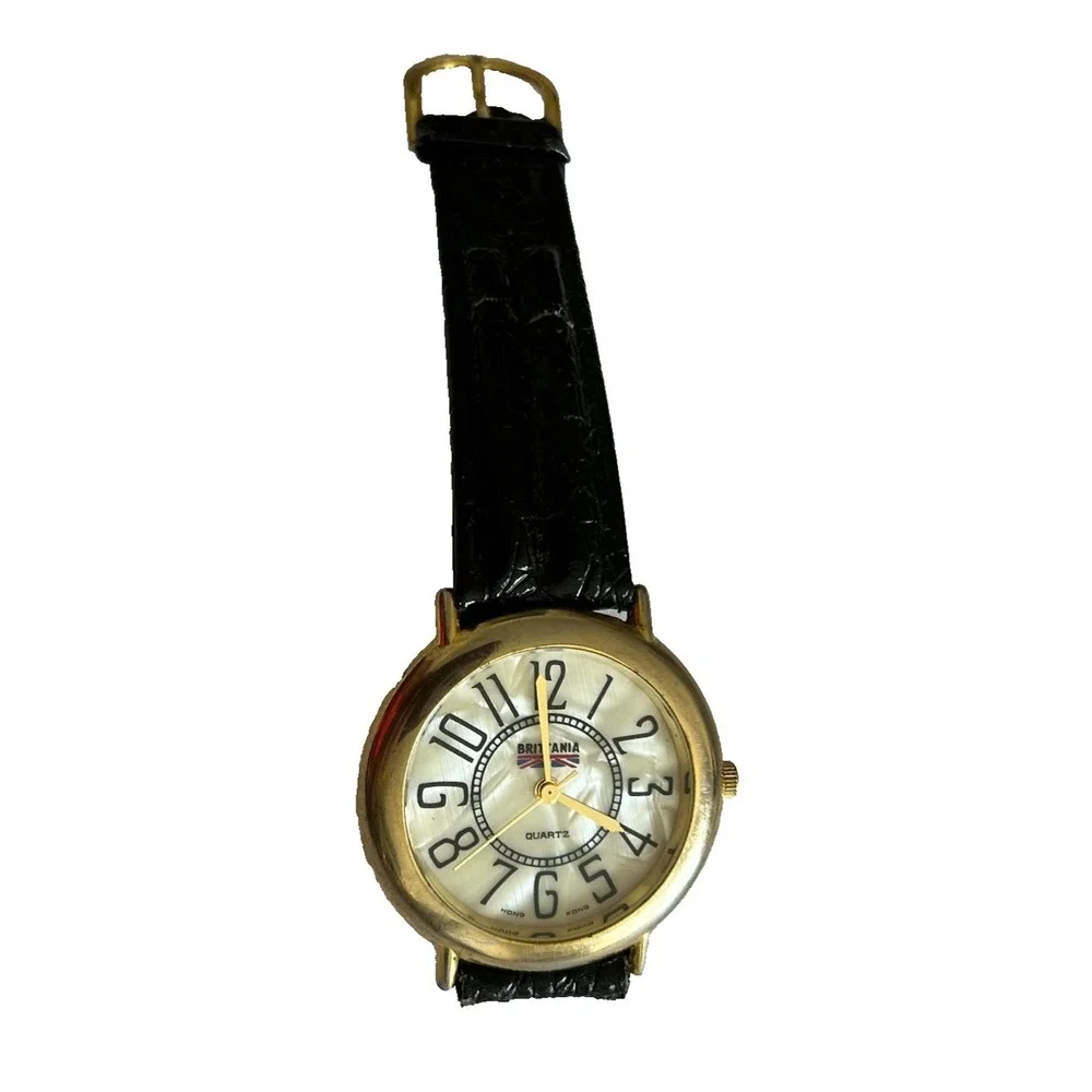 Vintage 1990s Brittania Watch by Quintel Inc Genuine Leather Band Retro